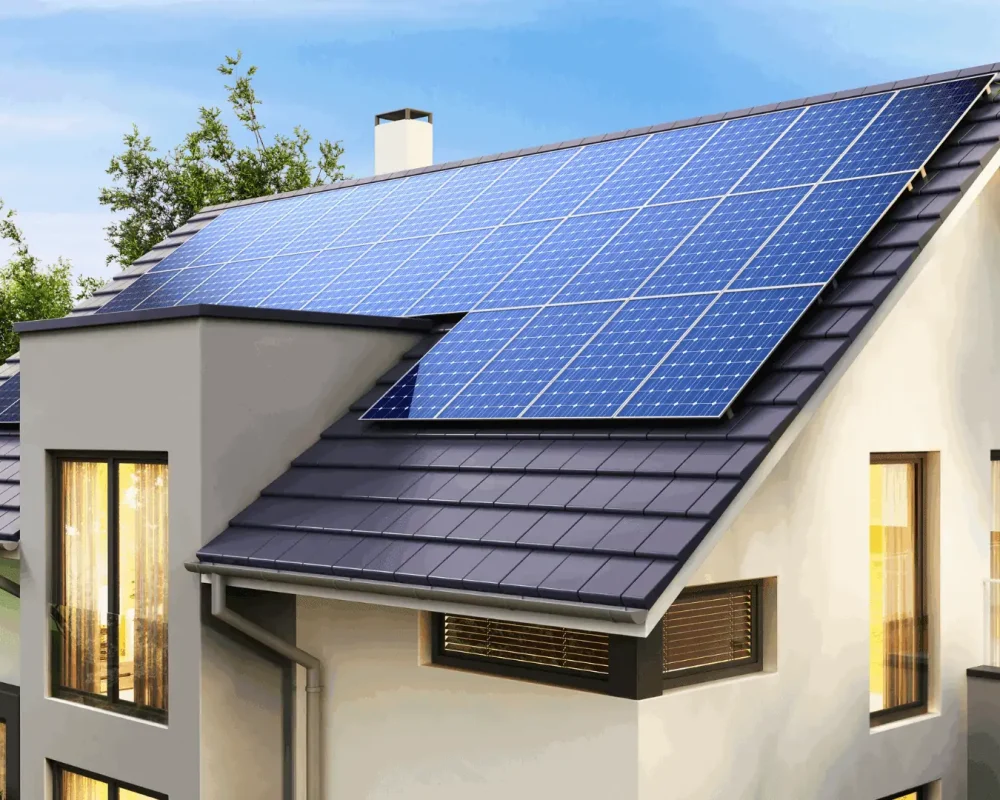 Modern Home with Rooftop Solar Panels | Sustainable & Efficient Living A modern house with a gray roof and white siding, showcasing a full array of solar panels on its roof.